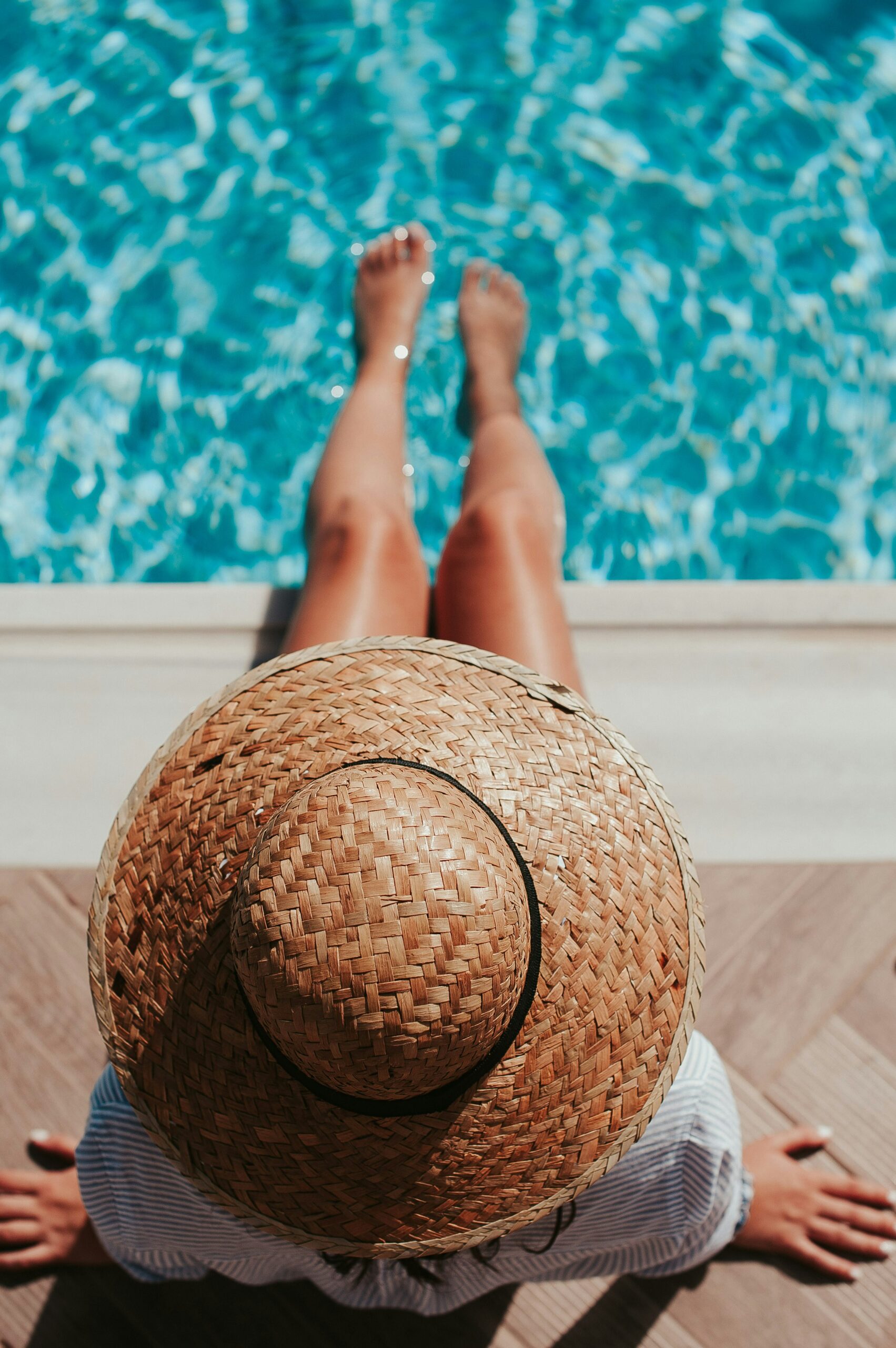 Have tattoos and want to swim in Japan? An honest local guide — why almost no pool allows visible tattoos, why a rash guard is the real answer, and where the sea sets you free.